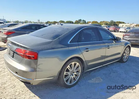 2015 Audi A8 Quattro z USA, uszkodzony, nr VIN WAUJGAFD9FN005299